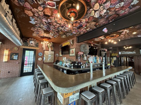 Main bar at Balloons under the photo-covered ceiling
